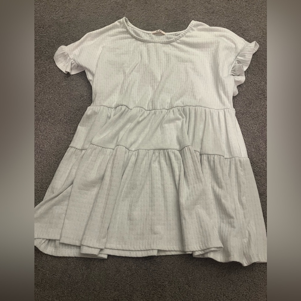White small shirt. Never worn. No tags
